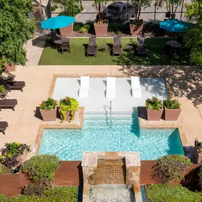 Pool with sundeck and water feature