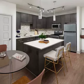 Kitchen with White Quartz Island and Pantry