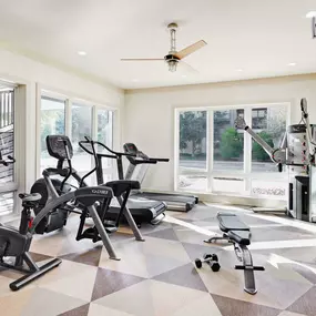 24 hour fitness center with cardio equipment and free weights