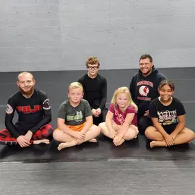 KIDS' PROGRAMS (5-12)
Kids will learn the art of Brazilian Jiu Jitsu self-defense while building self-confidence, self-esteem, focus, self-control, discipline and team building.