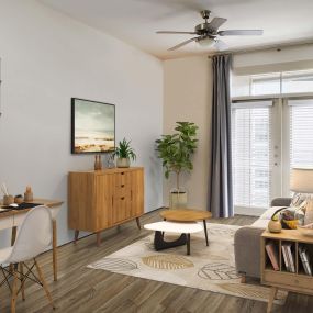 Living room space to work from home at Camden Lincoln Station Apartments in Lone Tree, CO