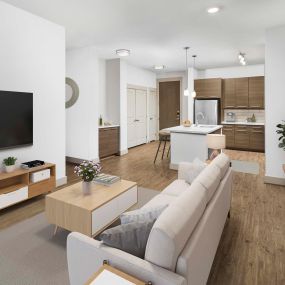 Open concept floor plans with wood-style flooring at Camden Lincoln Station Apartments in Lone Tree, CO
