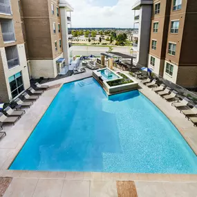 Resort style heated swimming pool at Camden Lincoln Station Apartments in Lone Tree, CO