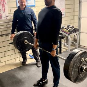No other exercise strengthens (and protects the low back from injury like the deadlift. Here, Sekhar is fully extended as he finishes a 1-rep max deadlift.
