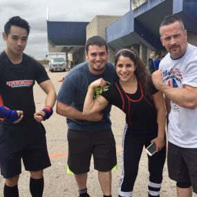 While competing in the Strongman Competition outside, Scott coached his clients in their first Powerlifting competitions inside.  They all had a blast together!