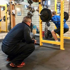 Here Kurt is performing a High Bar Squat.  He trained with us for 3 years, and achieved new heights in Strength & Health.