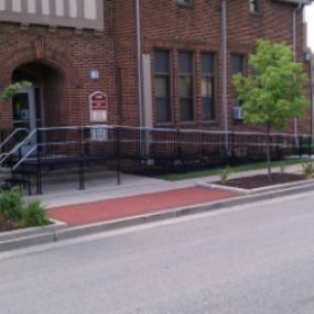 An Amramp wheelchair ramp makes a Senior Center building fully ADA-compliant and can be removed without damage to the historic structure.