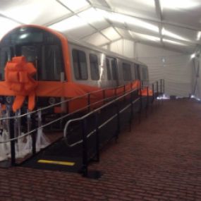 The MBTA unveiled a prototype of the new train cars for the Orange Line of the Massachusetts Bay Transit Authority (MBTA) at Boston City Hall Plaza. The MBTA turned to the Amramp Boston team to provide accessibility for everyone to be able to explore the new train cars.