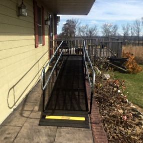 Dave McComb and his Southeastern Wisconsin team installed this wheelchair ramp in Kewaskum, WI. The customer reached out to Dave because it was becoming increasingly difficult to safely manage the steps to his home. Dave completed a free evaluation and designed this ramp. While the customer was busy at PT, his wife was very pleased with the quick solution and installation.