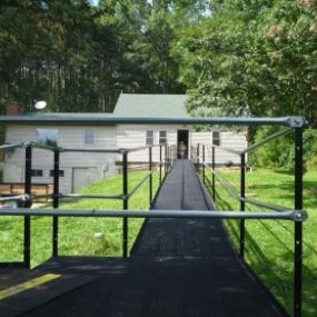 This Lyndon Station homeowner now has easy access in and out of his home with an Amramp wheelchair ramp.