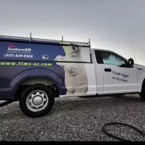 Tim's Southern Air Heating, Cooling & Plumbing work truck out in the field