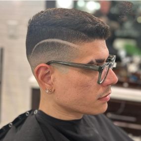 Mid Skin Fade Haircut with Design