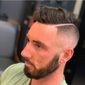 High Skin Fade Haircut with Hard Part