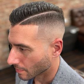 High Skin Fade Haircut with Hard Part