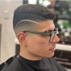 Mid Skin Fade Haircut with Design