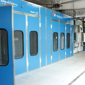 The image highlights the advanced spray booth facilities at Ball Body Shop