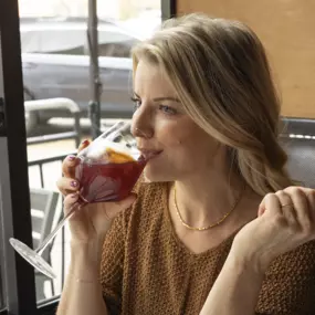 Guest enjoying a glass of wine