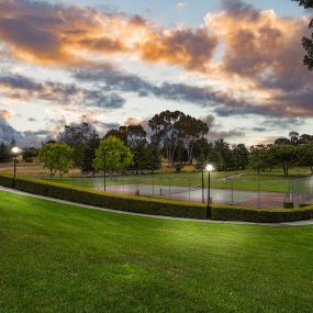 Beautiful dusk view of tennis court