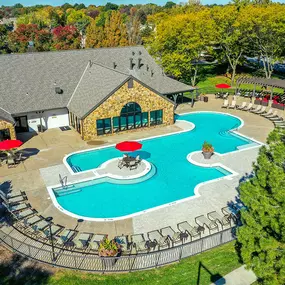 Revitalizing Resort Style Swimming Pool with Relaxation Space and Seating Area at Pointe Royal Townhome Apartments