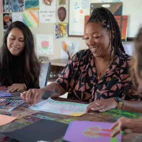 Clients participating in an art therapy session at Clearview, using creative materials in a group setting.
