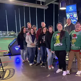 Unwrapping joy and swinging into the festive spirit at our Topgolf Office Christmas bash!