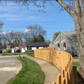 shadow box wood fence around side walk