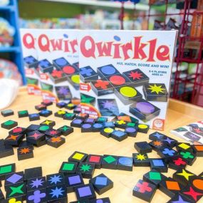 Mix, match, score, win! Qwirkle is the game for you! Stop by the store for Arts& Crafts and test it out!