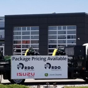 Isuzu medium-duty truck outside RDO Truck Center in Fargo, ND.