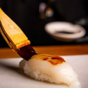 Crafting specialty nigiri sushi.