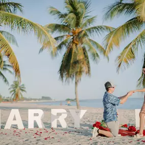 KEY WEST PROPOSALS!Proposal in Key West, Florida!
Sun, Sand, and Forever Love!
Looking to pop the question in a picturesque beach setting? Look no further than Key West! This tropical paradise offers the perfect backdrop for a romantic beach proposal. With its turquoise waters, powdery white sand, and stunning sunsets, Key West provides an idyllic setting for a memorable engagement.