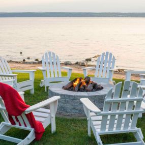 outside fire pit overlooking finger lakes at the Inns of Aurora