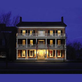 Image of house at night at the Inns of Aurora