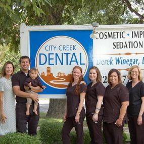 Dentist Dr. Winegar With Dental Staff