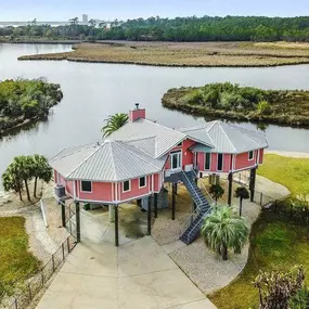 This home, elevated 18-ft., built on the Gulf Coast, replaced a “stick built” home destroyed by Hurricane Katrina.