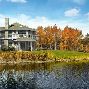 Designed with large view-facing windows and ample decking, this seasonal home is ideal for lakeside living. It was engineered for heavy snow loads and energy-efficiency with high-performance windows and insulations.