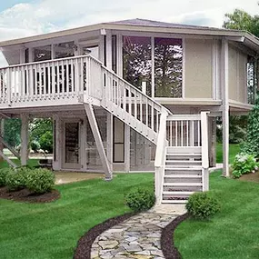 With room for the whole family, this two-story home, built in Myrtle Beach, SC, features a unique cantilevered design and low-maintenance exterior finish materials to protect it from the harsh coastal climate.
