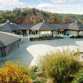 This beautiful multi-pedestal mountain home features luxurious interior spaces, expansive view side decking and fantastic views overlooking the river valley below.