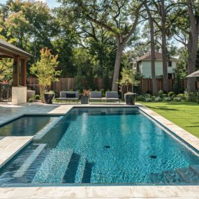 Rectangular pool and spa with stone decking