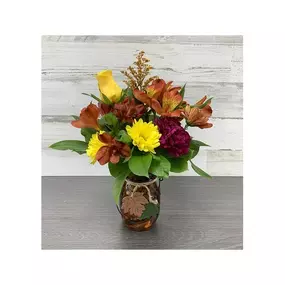 This charming fresh flower vase is sure to please! These long-lasting flowers in this glass mason jar are sure to charm someone special. Our florists select the freshest flowers available, so colors and varieties may vary due to local availability. **We strive to send the freshest flowers. That means they may arrive in bud-form. The benefit is they will last longer for the recipient to enjoy!