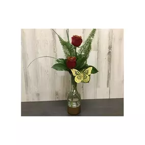 How can something this simple be this spectacular? Because our beautiful red glittered roses adorned with a butterfly are artfully designed in this modern glass vase.