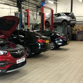 Cars inside the Vauxhall Service Centre Shiremoor workshop