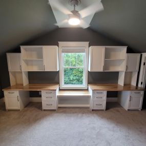 We can maximize storage even when you have an unusual roof line. This bonus room now has storage and is functional.