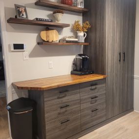 Customize your storage needs. This client chose a butcher block countertop, drawers and large cabinet.
