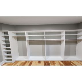 Custom closet in white, tailored to fit the clients needs and lifestyle.