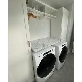 Experience the joy of a clutter-free laundry room with our custom storage solutions. Laundry time never felt so good!