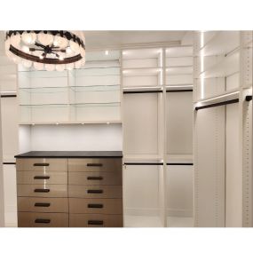 Elevate your closet game with our personalized storage solutions. Say goodbye to clutter and hello to style!