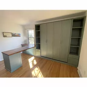 Working from home never looked so good! Create your dream home office/guest bedroom with our custom organization solutions like a built in Murphy bed with storage towers.