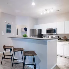 Bright Open Kitchens Complete with Stainless Steel Modern Appliances, Garage Disposal and More at Autumn Park Apartments