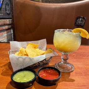 Our happy place: complimentary chips and salsas, and a Grandeza Margarita!