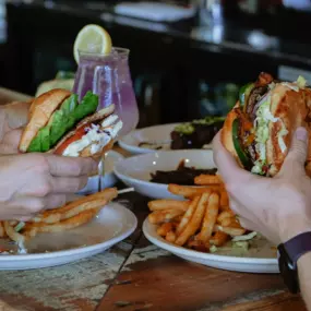 People eating burgers